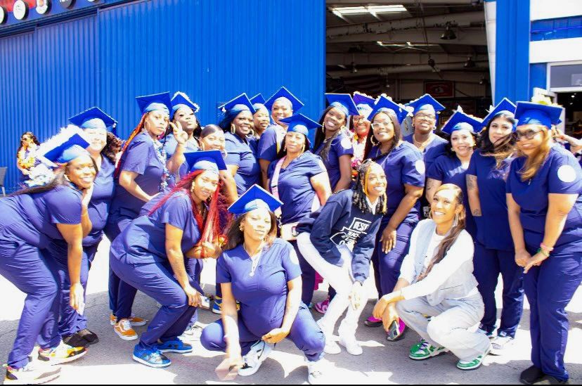 A group celebration in caps and gowns