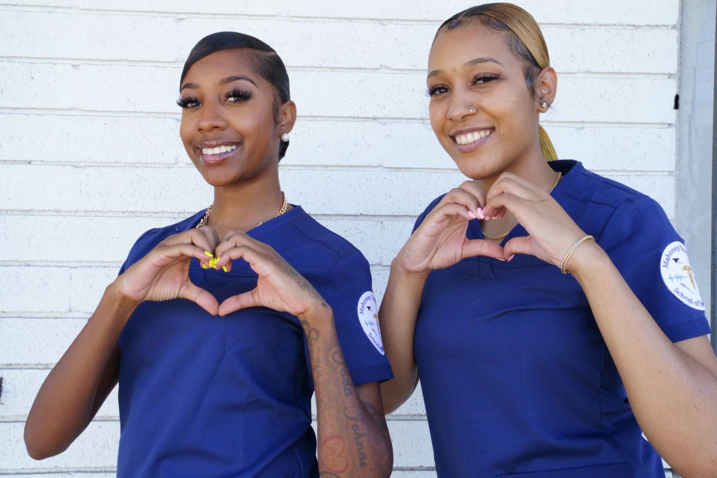 A shared moment in blue scrubs